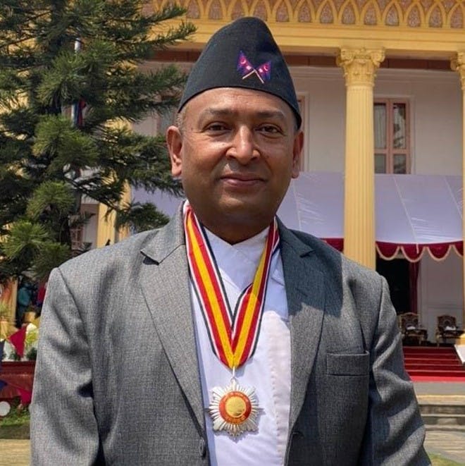 Suresh Adhikari  